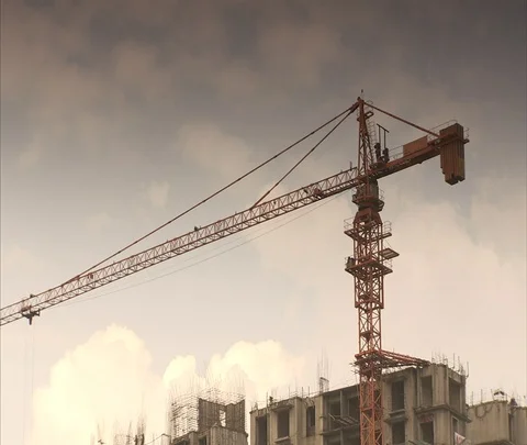 Crane atop building under construction. Stock Footage 86742581