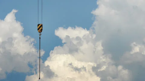 A crane on the background of beautiful clouds Stock Footage 25981426