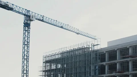 Crane boom on a construction site Video stock 86173832