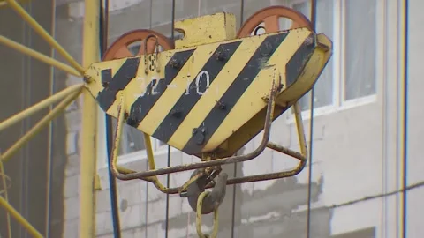 Crane boom work. Jib. Construction crane. Video stock 164681596