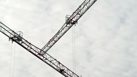 Crane Booms Crossing Stock Footage 321427056