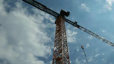 Crane bottom view with clouds passing in the sky Video stock 135690619