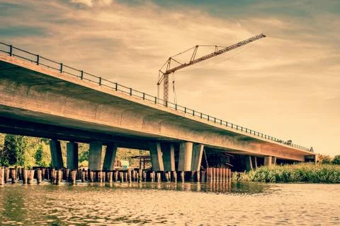 Crane at a bridge construction Stock Photos