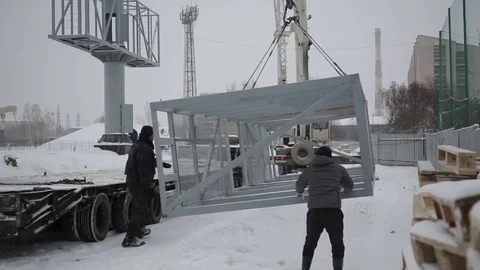 Crane bucket during installation with construction during installation big Stock Footage 84829391