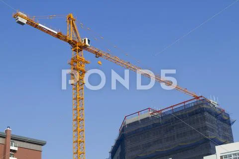 Crane building construction Stock Photos