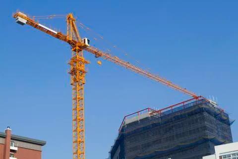 Crane building construction Stock Photos