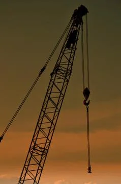 Crane on a building in construction Stock Photos