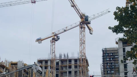 Crane building site. Building construction and development of a dwelling house. 스톡 동영상 115861810