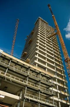 Crane building the skyscraper Stock Photos