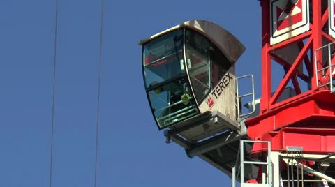 Crane Cab with Operator performing Manoeuver Stock Footage 68401301