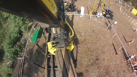 The crane carries a stack of logs. View from the boom crane Stock Footage 97596937