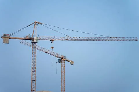 Crane on a clear sky background Stock Photos