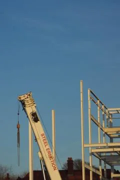 Crane Constructing the steel frame for the Crescent shopping mall in Hinckley. Stock Photos