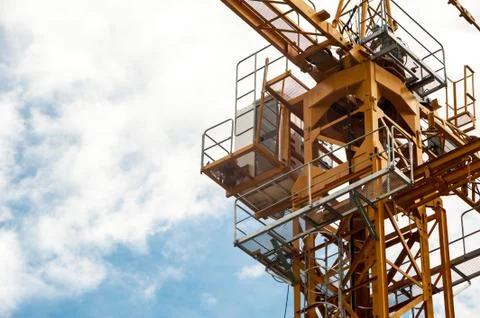 Crane in construction with blue sky Stock Photos
