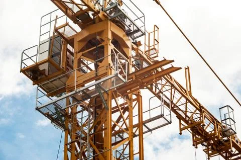 Crane in construction with blue sky Stock Photos