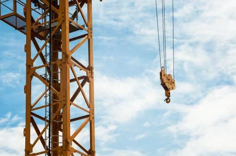 Crane in construction with blue sky Stock Photos