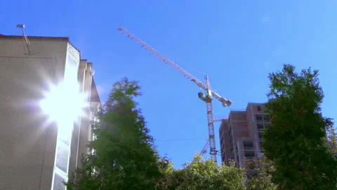 Crane on construction site against blue sky Stock Footage 85647162