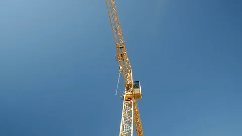 Crane at Construction Site Blue Sky, 4k Stock Footage 109464390