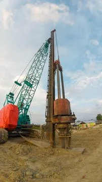 Crane in the construction site. Construction of a new house. Stock Photos