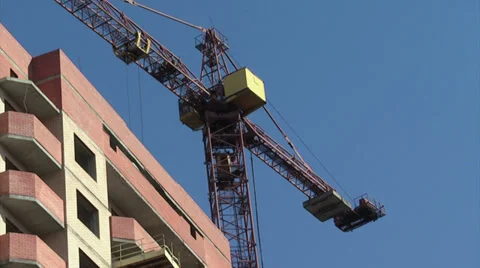 Crane in construction site medium shot Stock Footage 33863695