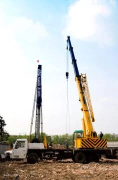 Crane in the construction site Stock Photos