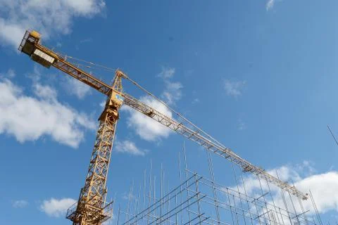 A crane in construction site Stock Photos
