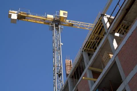 Crane at the construction site Stock Photos