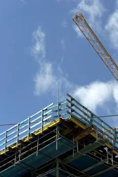 Crane on a construction site Stock Photos