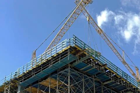 Crane on a construction site Stock Photos