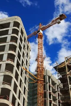 Crane at the construction site Stock Photos