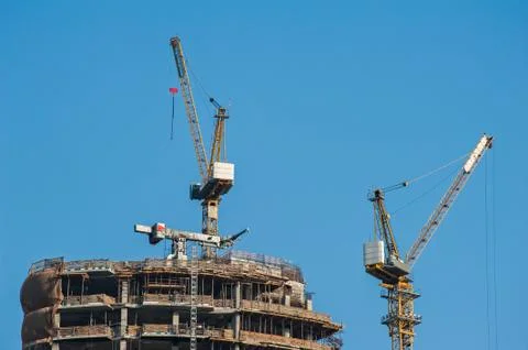 Crane at construction site. Stock Photos