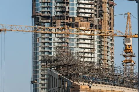 Crane at construction site. Stock Photos