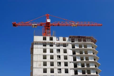 Crane on construction site Stock Photos