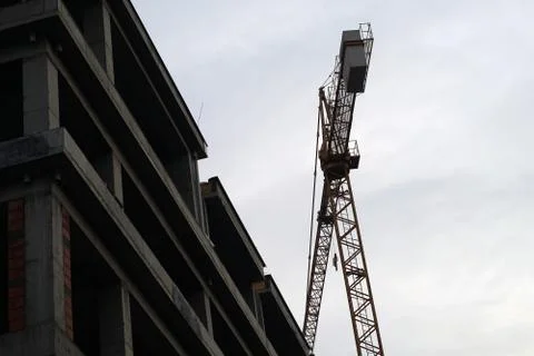 Crane on construction site Stock Photos