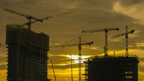 Crane in construction site under sunset Stock Footage 97628006