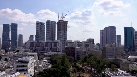 Crane construction work, View of Tel Aviv, Crane in motion Stockbeeldmateriaal 196974434
