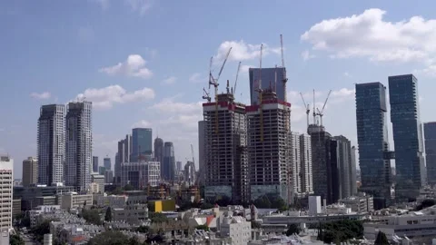 Crane construction work, View of Tel Aviv, Crane in motion Stockbeeldmateriaal 196974435