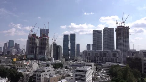 Crane construction work, View of Tel Aviv, Crane in motion Vidéo 196974994