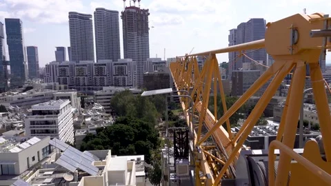 Crane construction work, View of Tel Aviv, Crane in motion Vidéo 196975704