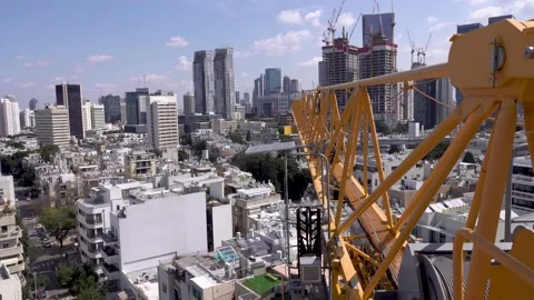 Crane construction work, View of Tel Aviv, Crane in motion Vidéo 196978652