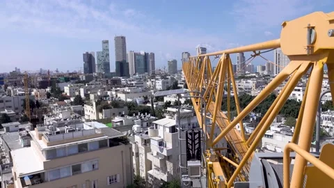 Crane construction work, View of Tel Aviv, Crane in motion Vidéo 196978801