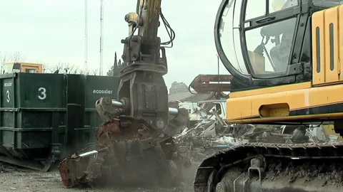Crane crushing an Old Car in a Scrap Yard near Buenos Aires, Argentina.   Stock Footage 149182043