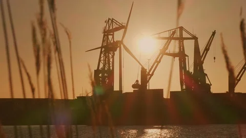 Crane discharging coals during sunset. Stock Footage 111334271