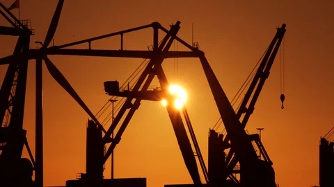 Crane discharging coals during sunset. Stock Footage 111336834