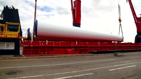 Crane dischatging Windmill tower from ship Port of Montoir France April 2016 Video stock 67208296