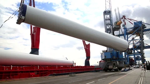 Crane dischatging Windmill tower from ship Port of Montoir France April 2016 Video stock 67208317