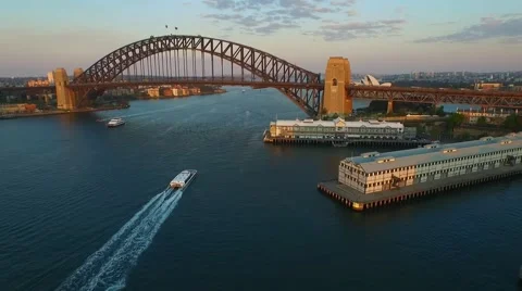 Crane down with Speed Ramp of Aerial footage of Sydney Harbour Bridge Stock Footage 65483287