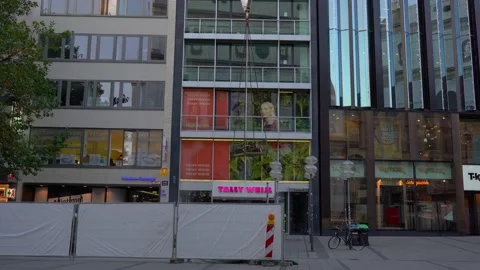Crane drops the load on the construction site Stock Footage 171069882