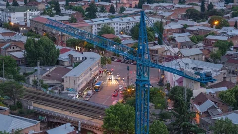 Crane in the evening city time-lapse Stock Footage 168947869