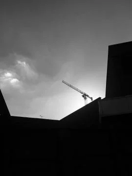 Crane in the evening skyline Stock Photos